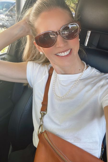 Easy, classic transitional outfit

White tshirt, black tailored shorts or pair it with tailored pants for cooler temps, pearls, belt bag crossbody Fanny pack, loafers, Abercrombie, g.h. Bass 

#LTKfindsunder50 #LTKstyletip #LTKtravel