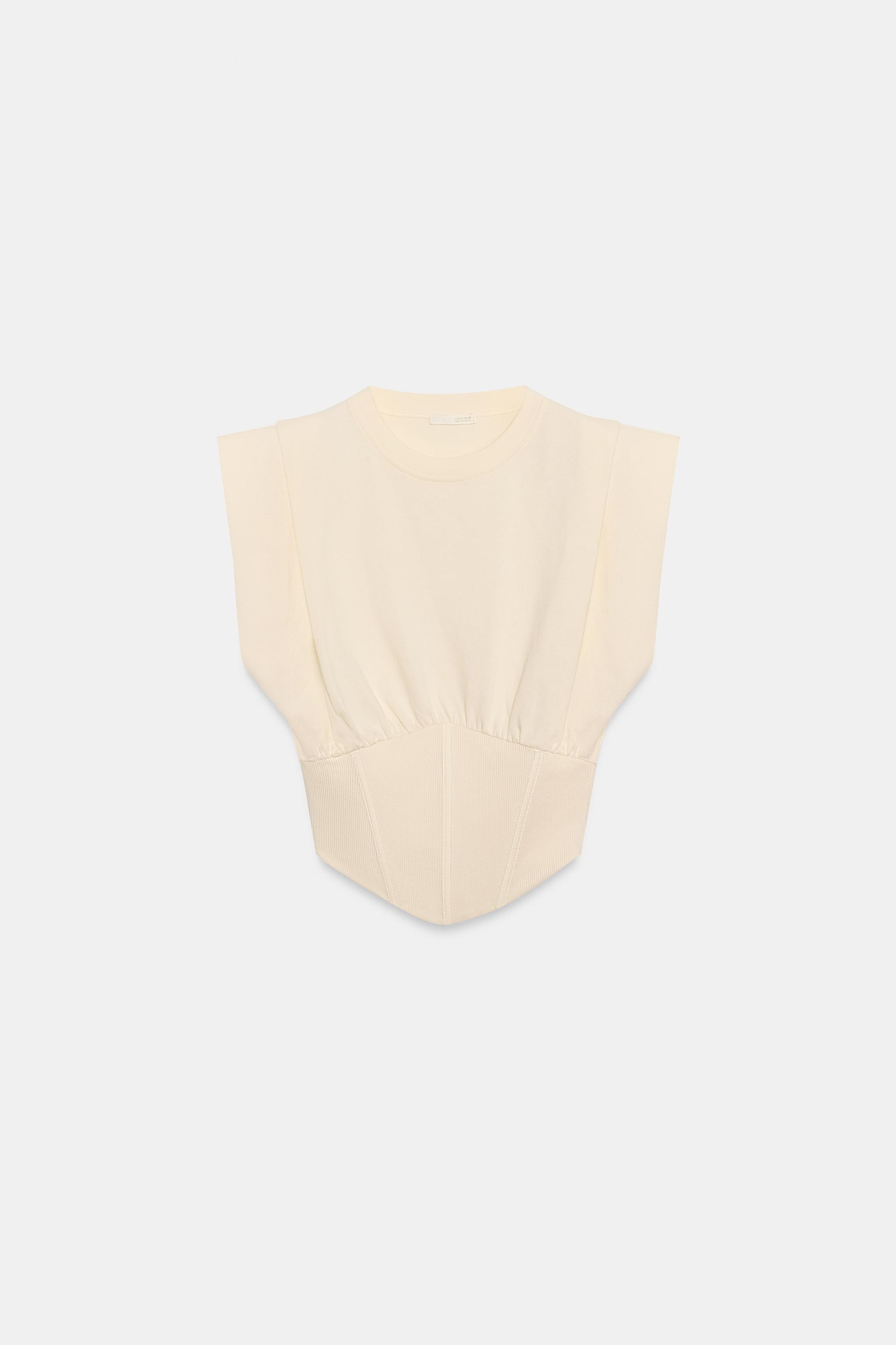 Corsetry-inspired top crafted in cotton. Featuring a round neck and sleeveless design. Finished w... | Zara UK