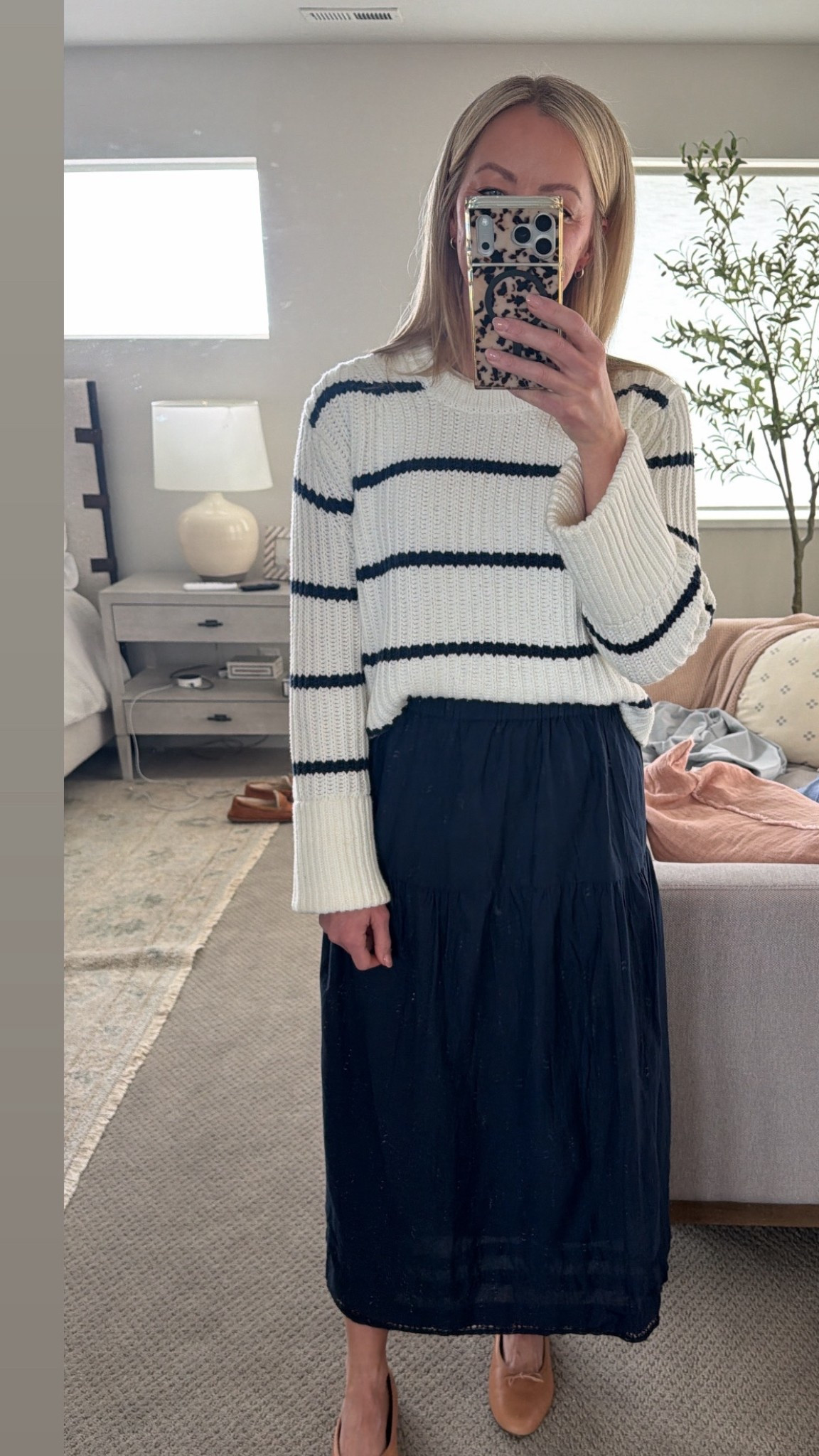 Ready for spring!

Sweater is old J.Crew but linking a similar quince one. 

Wearing size medium in the skirt  