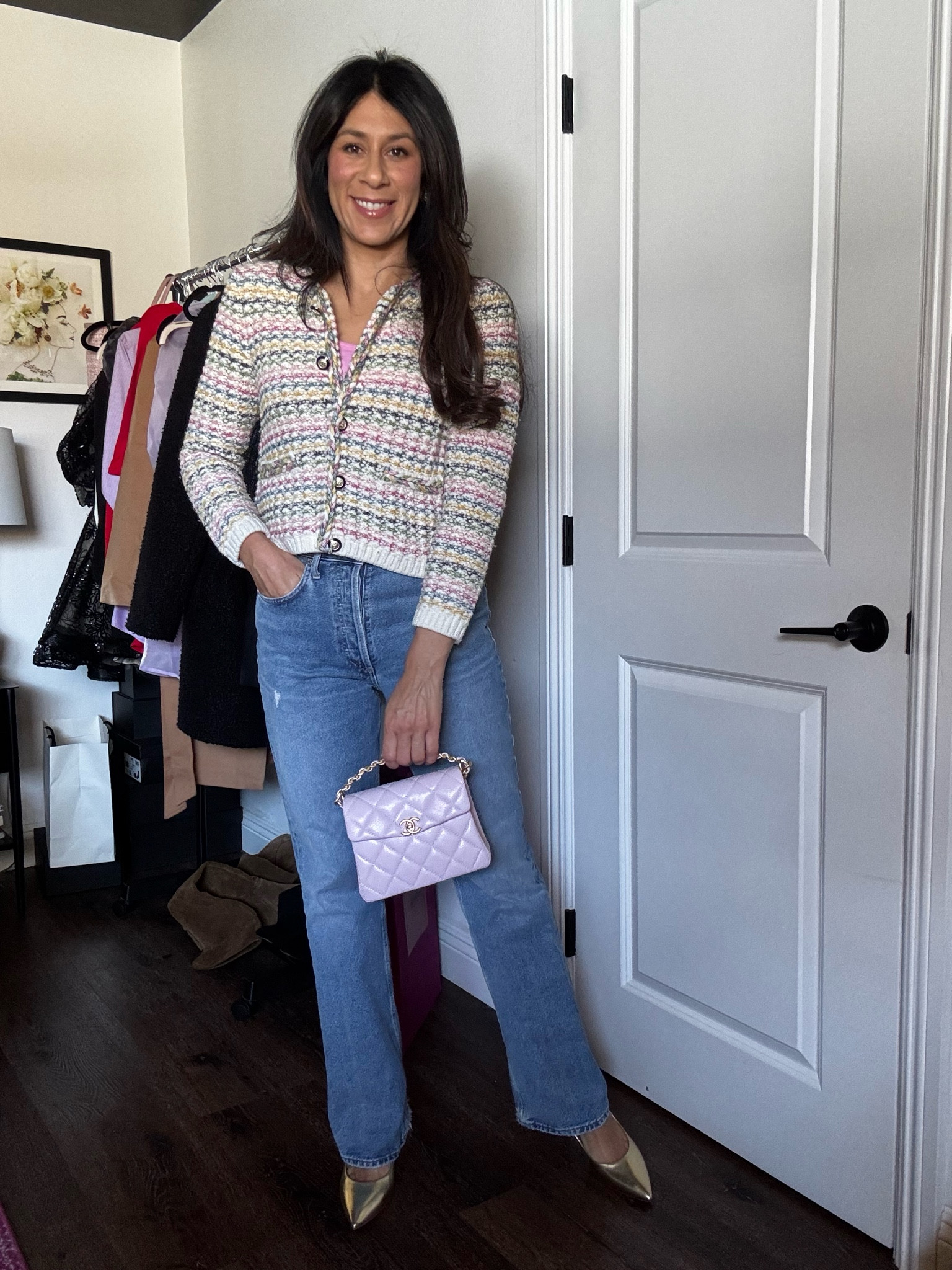 Casual chic with a pop of pastel 🌸 Loving this cozy knit moment paired with denim and my mini Chanel in the dreamiest shade of lilac 💜✨ #OOTD #EffortlessStyle #ChanelLover