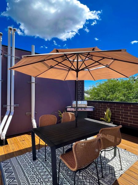 The other side of our rooftop. I give a lot of love to our outdoor sofa side but our outdoor dining table is a vibe too. We plan to be outside the rest of summer and even into fall! 

These dining chairs have lasted us through multiple snowy winters outside 

Home decor, rooftop decor, outdoor furniture 

#LTKparties #LTKSeasonal #LTKhome