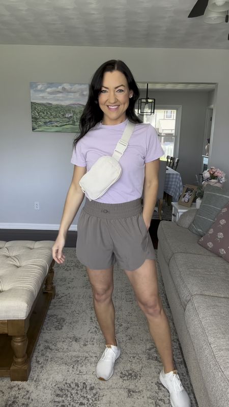 $20 Target shorts that give off Varley vibes👏 There’s a 100% chance I’ll be wearing these high-waisted shorts weekly this summer! I love the high-rise, length, color options, and pockets! Styled them with my favorite $5 tee from Target, $9 belt bag, and under $50 white sneakers. 

Sizing:
Shorts fit TTS. I’m wearing a S.
Target tees fit TTS, also wearing a S.
The tight fitted active white top runs a little small, I sized up to a M.
Shoes fit TTS. 
Purple pullover fits TTS, wearing a S.

Activewear outfit, casual style, casual outfit, affordable, mom style 

#LTKfindsunder50 #LTKsalealert #LTKSeasonal