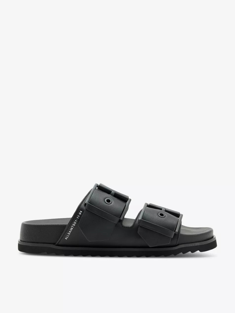 Sian logo-embossed leather flat sandals | Selfridges