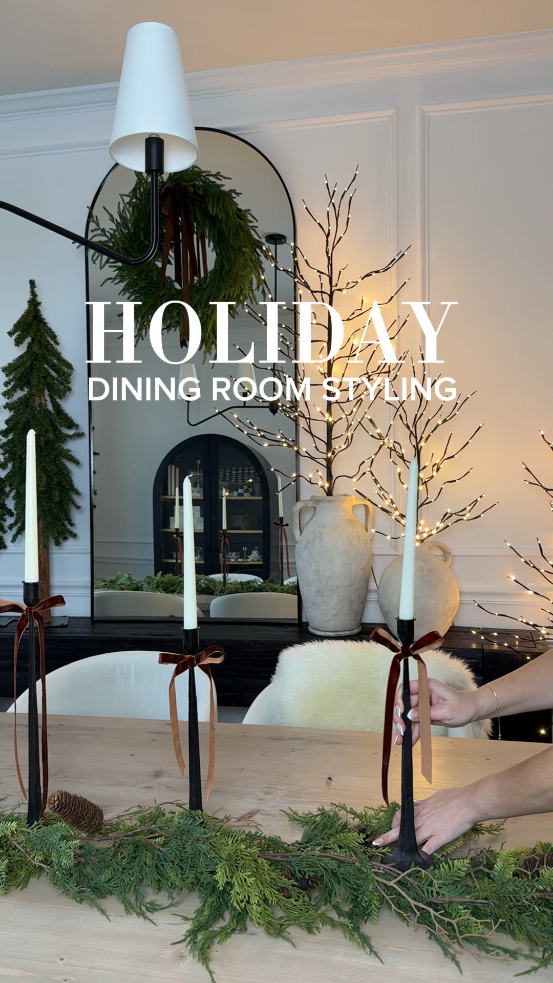 Holiday dining room, dining table, dining chairs, rug, Christmas tree, mirror, chandelier, candle holder, candles, ribbon, console table, cabinet, wreath 

#LTKHoliday #LTKWatchNow #LTKSeasonal