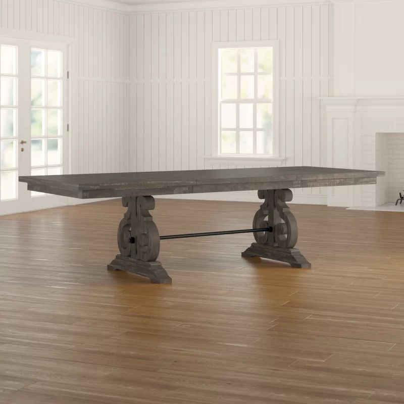 Machuca Extendable Rubberwood Solid Wood Trestle Dining Table | Wayfair North America