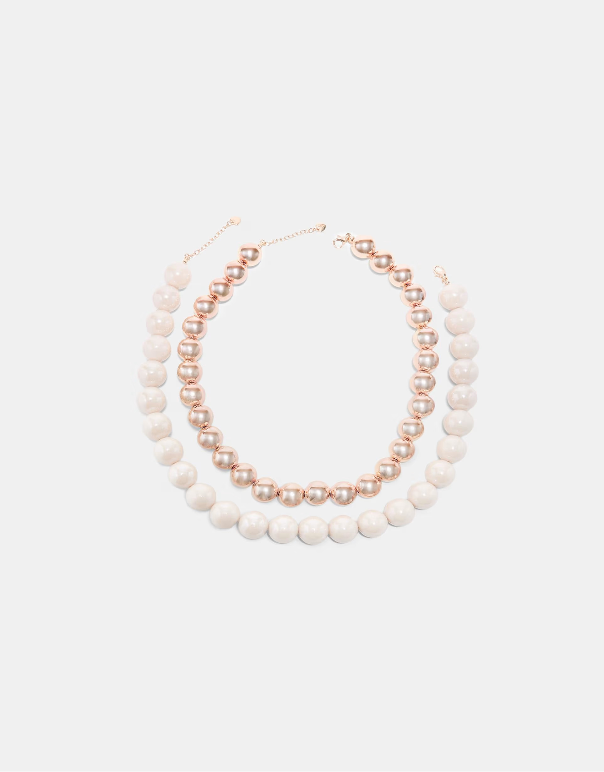 Stradivarius \u2013 2er-Set Halsketten in Ecru mit Perlenverzierung | ASOS (Global)