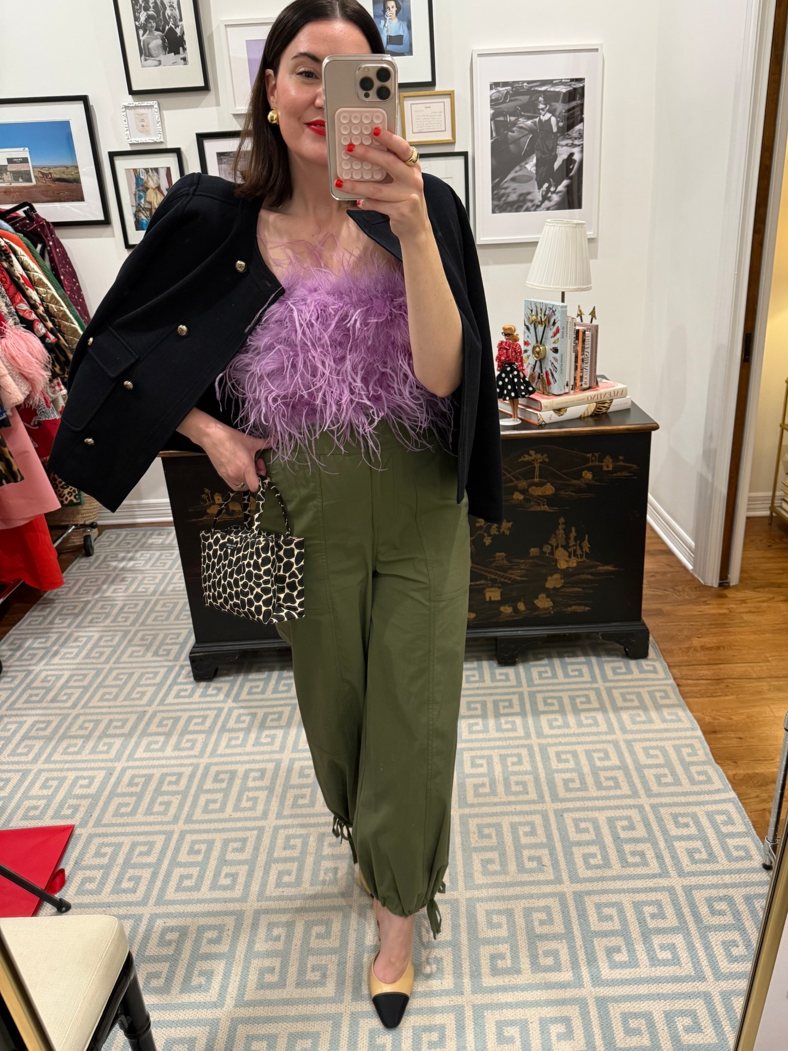 Love this feather top! I have it in 2 colors. It has no stretch & boning, so when in doubt I would go up. I’m in the medium. 

#LTKOver40 #LTKFindsUnder100 #LTKSaleAlert