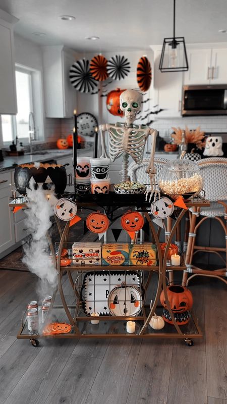 Halloween party concessions bar cart idea! Linked my Target light up skeleton, this Amazon bar cart, Target Halloween snacks, and the cutest party decor supplies from My Minds Eye!

#LTKHalloween #LTKVideo #LTKhome