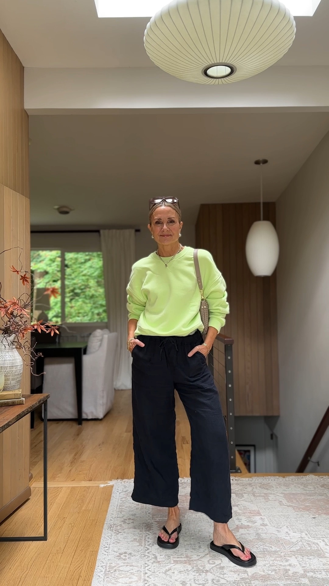 Loving the new @Spanx   Zest color! The softest, coziest fleece crewneck sweatshirt ever! Styled with @Splendid  navy linen pants (code FOURTH 40% off!) and flip flops. 
#ltksalealert

#LTKOver40 #LTKootd #LTKTravel

#LTKActive #LTKgrwm #LTKmomlife