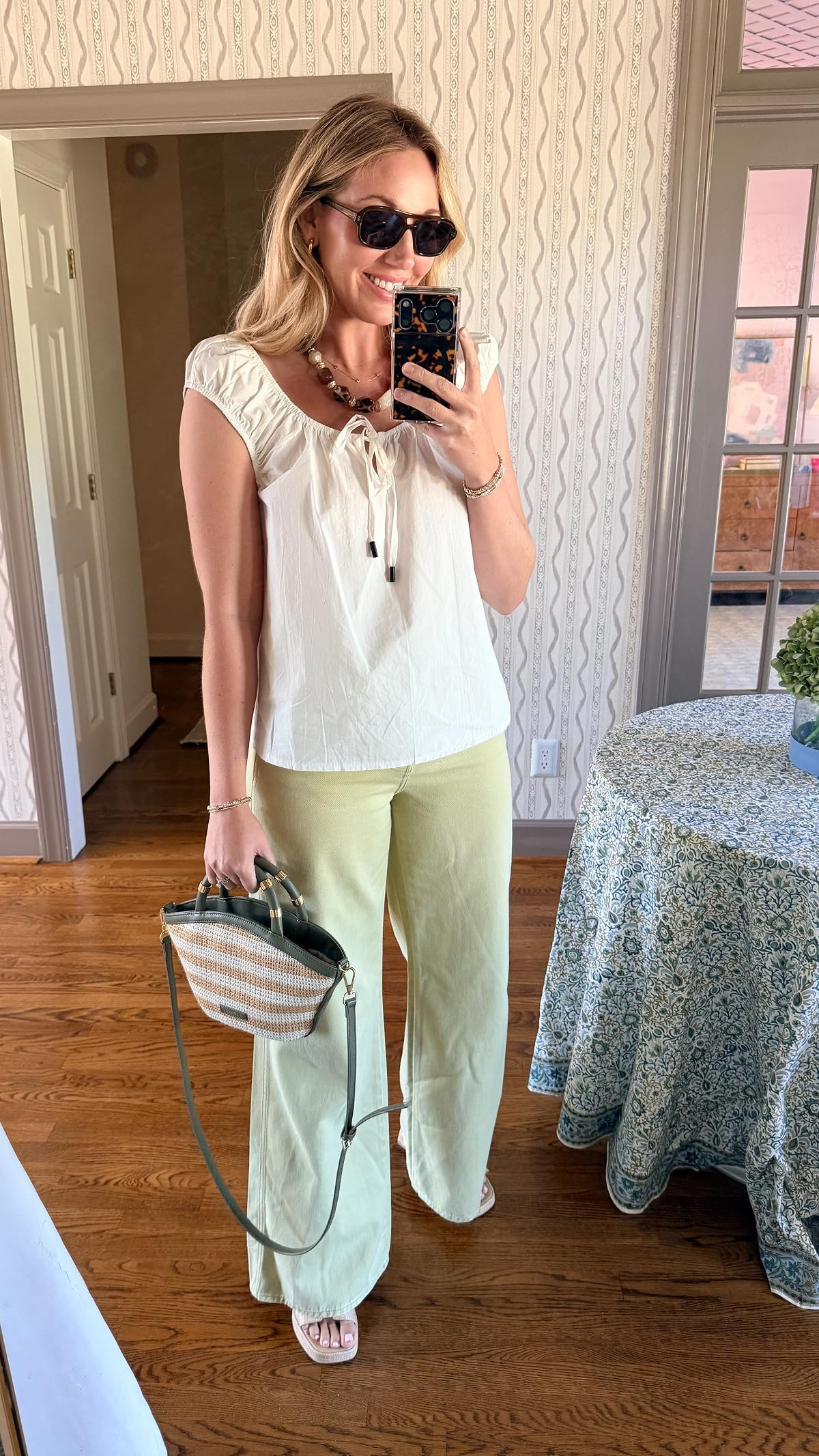 OOTD mixing high and low! Veronica Beard wide legs jeans are so comfy! Mine are the Pistachio color, but linking a gorgeous green for fall available on Amazon. I’m in size 28. Wearing size small in baby doll top 

#amazonfashion #OOTD #TheSouthernSource 

 #LTKdayinmylife #LTKgrwm #LTKootd