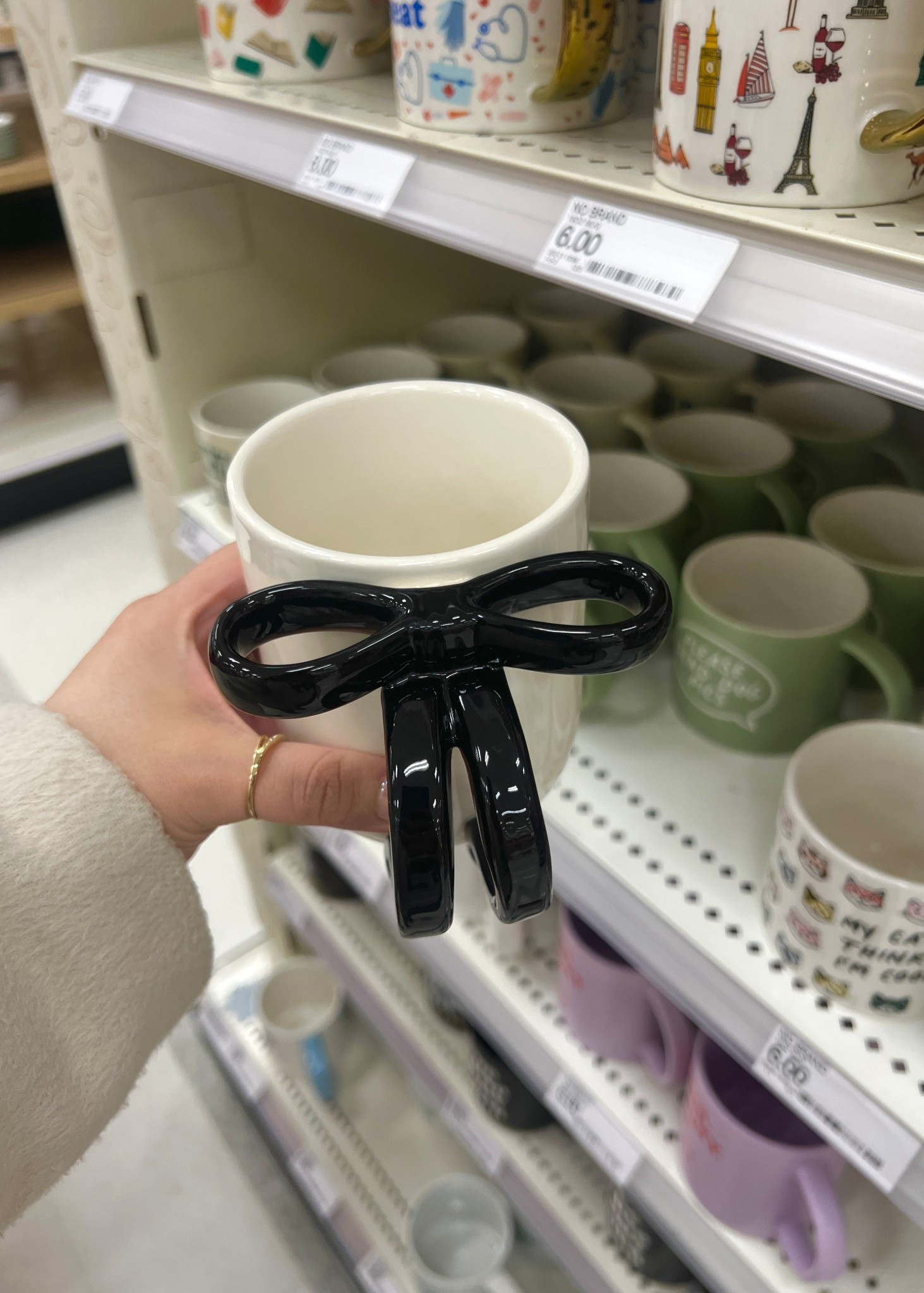 National Brand One Design Home 16 oz White Mug with Black Figural Bow Handle and other cute $6 mugs

#LTKGiftGuide #LTKHoliday #LTKmorningroutine