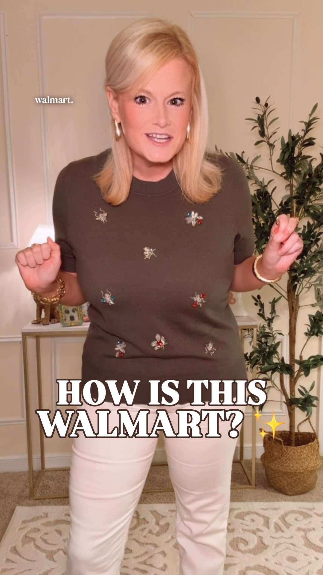 Walmart fall fashion | Erdem look for less | embellished insect sweater | teacher outfits

How is this on Walmart? Free Assembly translated the jeweled-insect language of Erdem’s $895 embellished short-sleeve knit into a sweater tee under $30. The shimmering bees, dragonflies, ladybugs and tiny jeweled bugs sit across the deep olive knit like a collection of vintage brooches. The crewneck, short sleeves and tall ribbed trim keep the silhouette polished and make those faceted details the entire point.

I’m in a large for a roomier fit. The lightweight Cozy Yarn is incredibly soft, holds its silhouette and is machine washable. It is 50% viscose, 28% polyester and 22% polyamide.

This is exactly the kind of wear-now, layer-later fall find I love. Pair it with white denim or trousers while it is warm, then add a blazer, midi skirt, loafers or boots for teacher outfits, business casual workwear, church, dinner and preppy fall outfits. The olive color and jewelry-like embellishment give a simple sweater-and-pants outfit real personality.

It earns closet space because it handles early fall heat now and layers easily once sweater weather arrives.

Walmart sweater, Free Assembly sweater, Erdem inspired sweater, designer sweater look for less, embellished sweater women, beaded insect sweater, jeweled sweater, brooch sweater trend, novelty sweater, sweater tee women, short sleeve sweater, olive green sweater, early fall outfits, fall outfits women, teacher outfits women, work outfits women, business casual outfit, preppy fall style, Walmart fashion finds

#LTKFindsUnder50 #PreppyStyle #WorkOutfits #TeacherOutfits #BackToSchoolOutfits #LookForLess #WalmartFinds #WalmartStyle #FreeAssembly #FallOutfits

#LTKSeasonal #LTKWorkwear #LTKootd