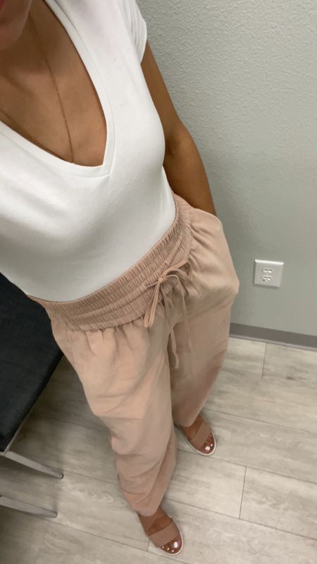 OOTD🤍🤎
I’ve been in the exam room waiting on my doctor for 35 minutes now😒  got bored so took a quick video of my outfit!😉
Gotta share these drawstring wide leg pants with you all! They are buttery soft, thick material and they’re also on sale right now! I really want to get them in black as well and the light blue one are so beautiful (but those aren’t on sale) 
The waistband is tight but stretches and since I don’t have big hips, it wasn’t a big issue putting them on and the length is also perfect , not too long! 🙌🏽Wearing a size xs. 

#LTKstyletip #LTKsalealert #LTKxNSale