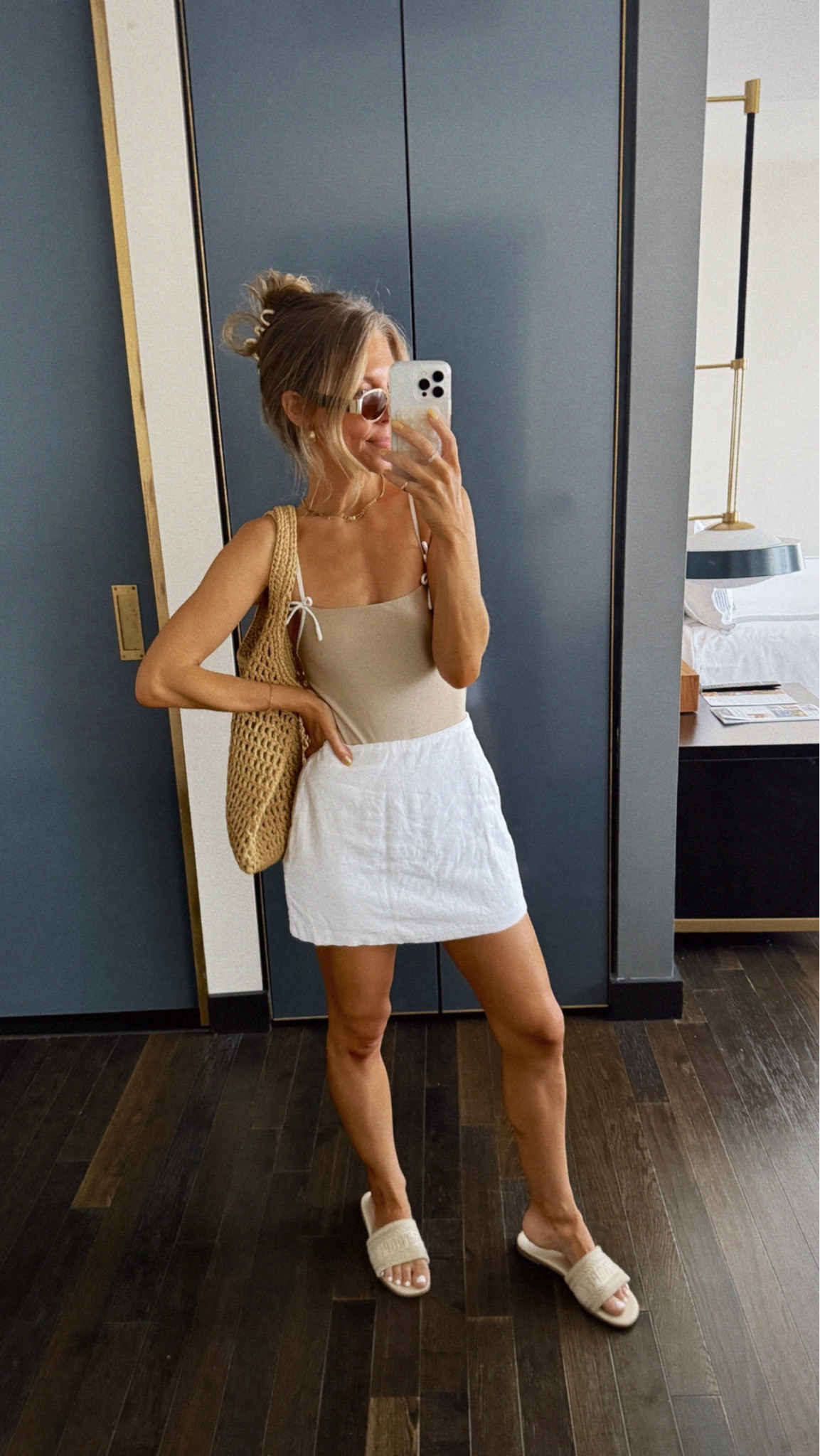 Pool day outfit! Revolve one-piece swimsuit with bows size small (runs small) and a linen skirt with built in shorts from Abercrombie size 25/XS. Target sandals. Aritzia bag  


#LTKSwim #LTKFindsUnder100 #LTKStyleTip