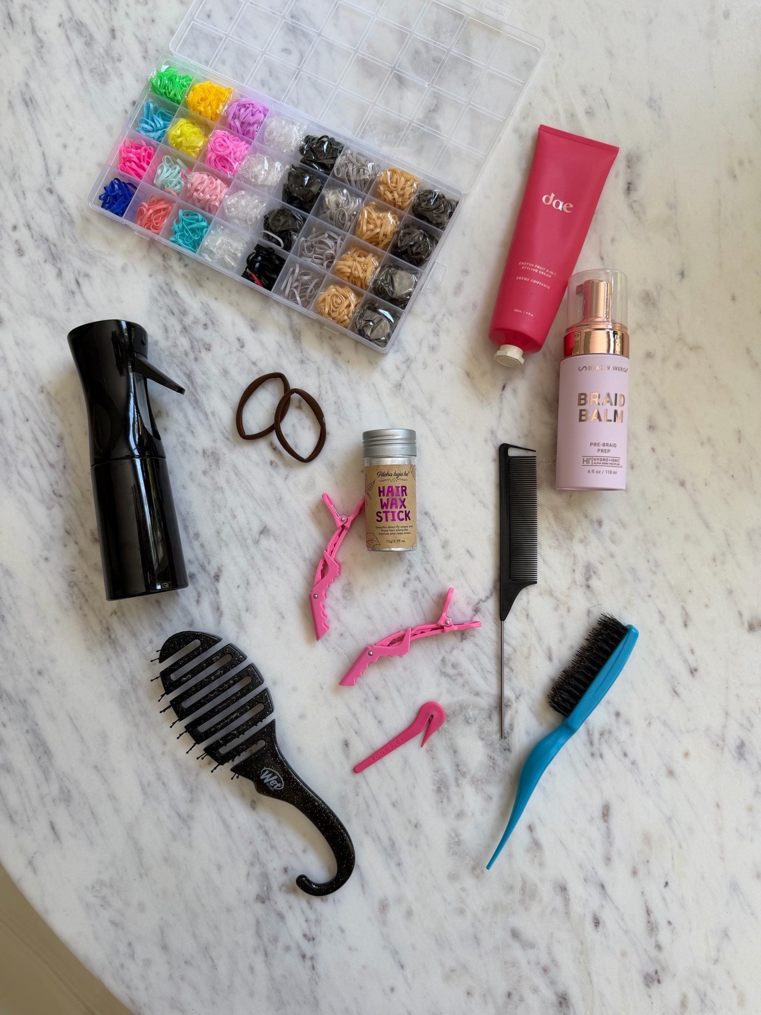 Soccer hairstyles and supplies for braids and sporty ponytails
Hair elastic kit and brush