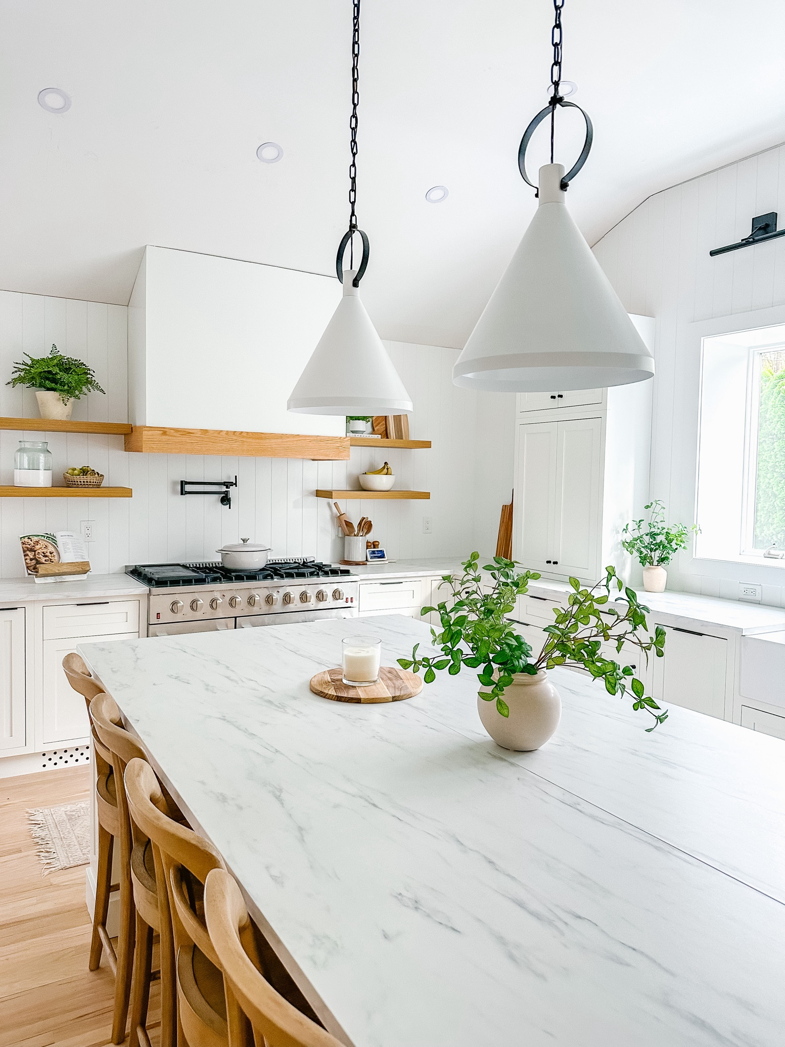 Our McGee & Co dupe pendant lights are crazy discounted from when we purchased them! They’re now 2 for $60!! We paid $60 each I think! Almost identical to McGee & Co.

White, wood and black  modern kitchen 