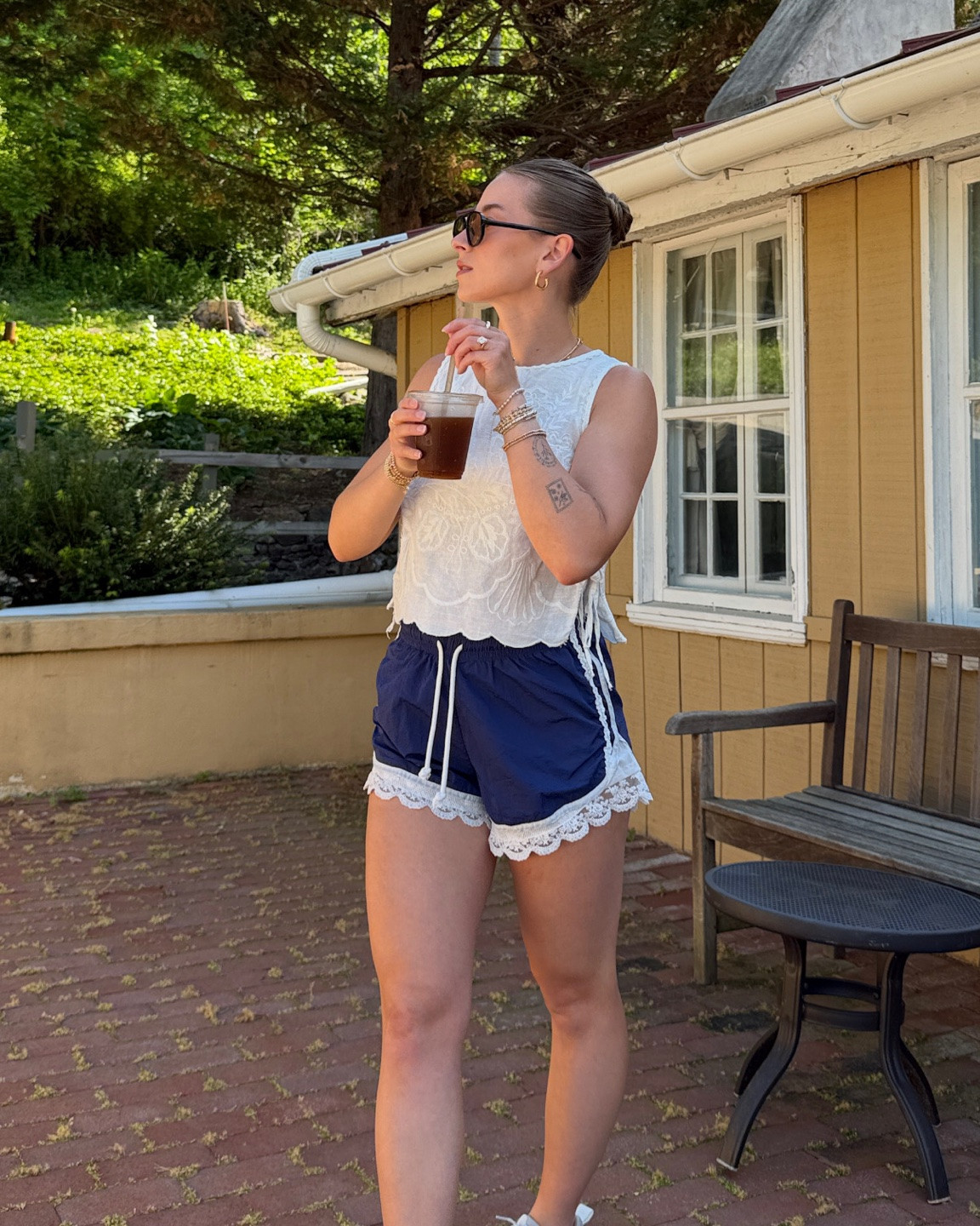 5/20/26 Sporty Chic Summer Outfit

A casual sporty-chic summer outfit 🤍 styled my lace trim activewear shorts from Anthropologie with a lightweight Free People top, Nike sneakers, and simple Amazon sunglasses for an easy everyday look. Comfortable but still feels cute and elevated—everything is linked here ✨

#LTKootd #LTKSeasonal