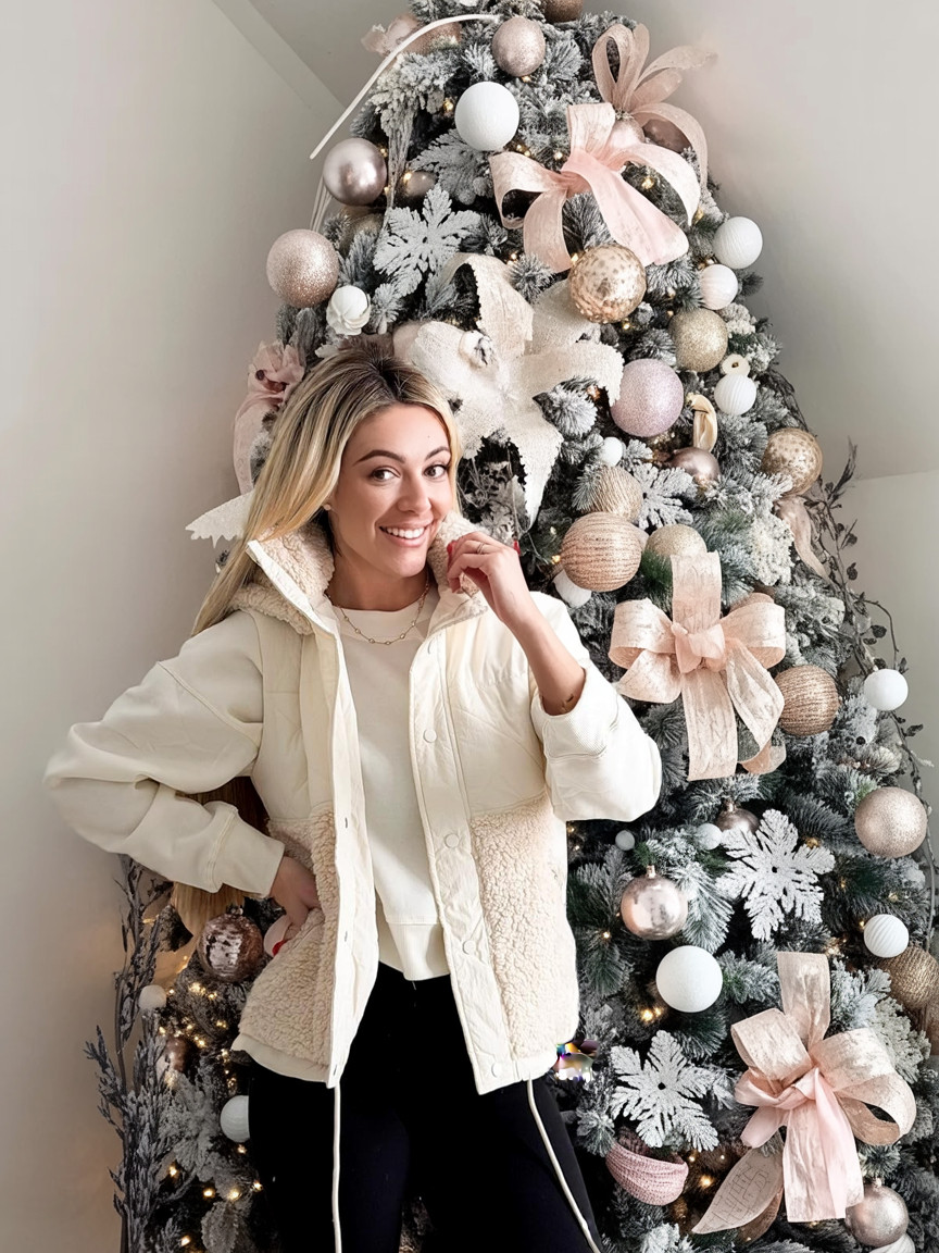 Cozy Winter Outfit Inspiration by the Christmas Tree

This soft and cozy winter look is perfect for the holiday season. A neutral sherpa-lined jacket layered over a simple sweatshirt creates an effortless, warm outfit that feels polished but comfortable. Styled with classic black leggings and minimal jewelry, this look is ideal for decorating the tree, holiday gatherings at home, or casual winter days when you still want to look put together. Neutral tones and soft textures make this outfit timeless and easy to recreate all season long.

#winteroutfit #holidayoutfit #cozystyle #neutralfashion #winterlayers #casualwinter #holidayinspo #christmasstyle #everydayfashion #amazonfashion  

 

#LTKHoliday #LTKootd #LTKOver40