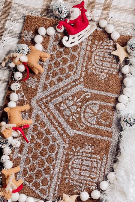 The $5 Gingerbread House DOORMAT from FIVE BELOW! ✨🎄

You just can’t beat that bargain!👏🏻👏🏻

Tag and share with a friend! Don’t forget to pick one up this weekend before they sell out.

Santa’s sleigh garland @ellieandpiperco 
Disco Ornaments @hobbylobby 
Star Garland @target 
Layering Rug @worldmarket 

#doormatsofinstagram #gingerbreadhouse #fivebelowfinds #fivebelow #frontdoordecor #holidaymagic #diyreels #holidayreels #fypviral

#LTKhome #LTKHoliday #LTKSeasonal