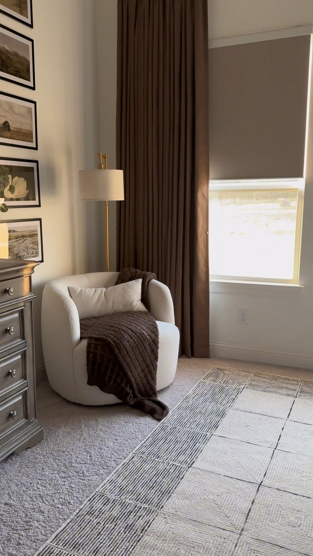 Master bedroom, accent chair, rug, motorized blinds, brown curtains, king bed, picture frames, king bed, dresser, nightstands 

#LTKHome #LTKmomlife