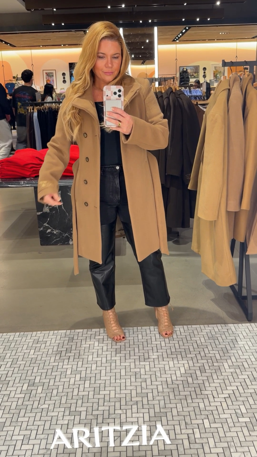 Here’s a polished, LTK-ready caption you can use:

Trying on the perfect camel coat 🤎
This classic camel coat instantly elevates any outfit—timeless, chic, and so flattering. I styled it two ways with a black top, faux leather pants, and neutral heels for an effortless fall-to-winter look. A must-have layering piece you’ll wear year after year. Linked similar styles I’m loving! ✨🧥

Wearing the small but the medium would have been better 

#LTKSaleAlert #LTKOver40 #LTKSeasonal