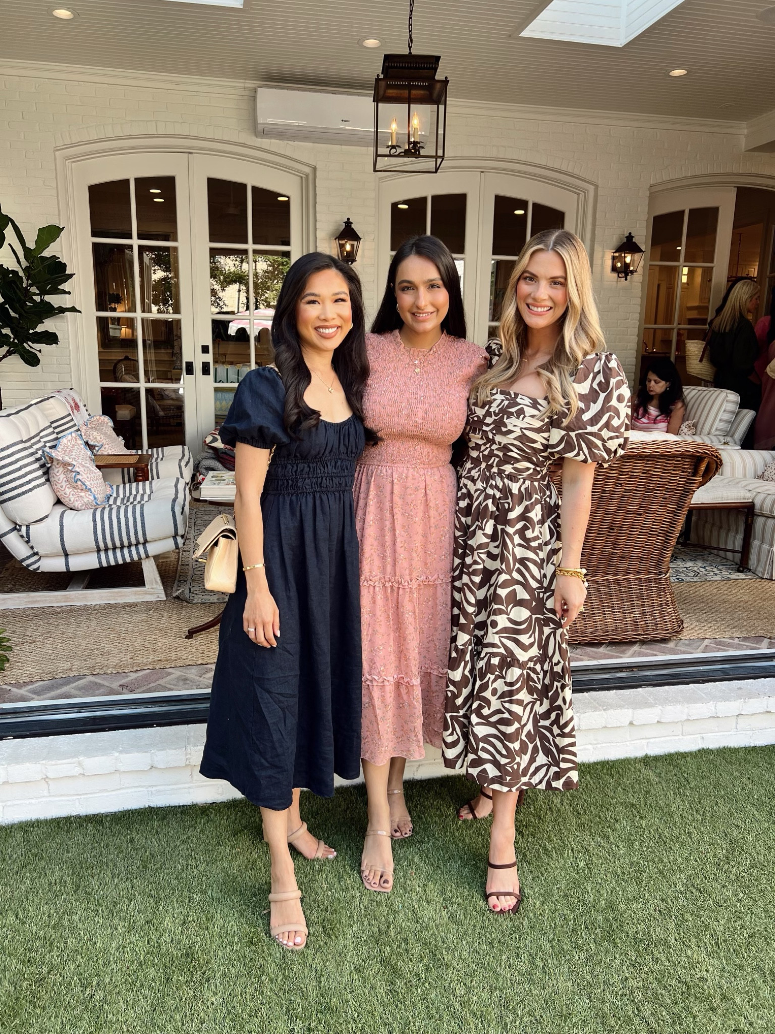 Early fall dresses with navy tiered dress with puff sleeves, floral long sleeve shirred dress and brown puff sleeve midi. My dress is size XS

#LTKStyleTip #LTKSeasonal