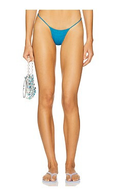 Indah Windy Skimpy Solid Smocked String Sides Bikini Bottom in Jellyfish from Revolve.com | Revolve Clothing (Global)