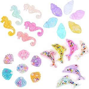 24 Pack Multi Glitter Ocean Animals Seashells Conch Dolphin Seahorse Slime Charms Slices Resin Be... | Amazon (US)