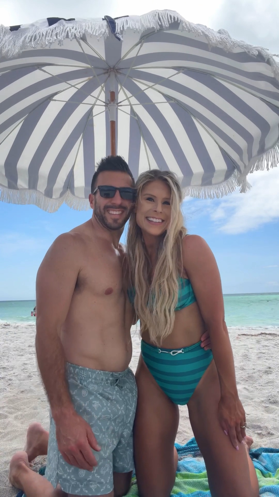 Green + Blue Striped Underwire Bikini Top + Matching Highwaisted Bikini Bottoms styled as a beach outfit, summer outfit, pool outfit, boat outfit, resort outfit, or vacation outfit . The underwire bikini top or highcut bikini bottoms can be mixed + matched with other styles that come in the same pattern. There’s also a matching swim coverup. My husband is wearing a size small in the 5 in  swim trunks.

#LTKTravel #LTKootd #LTKSwim