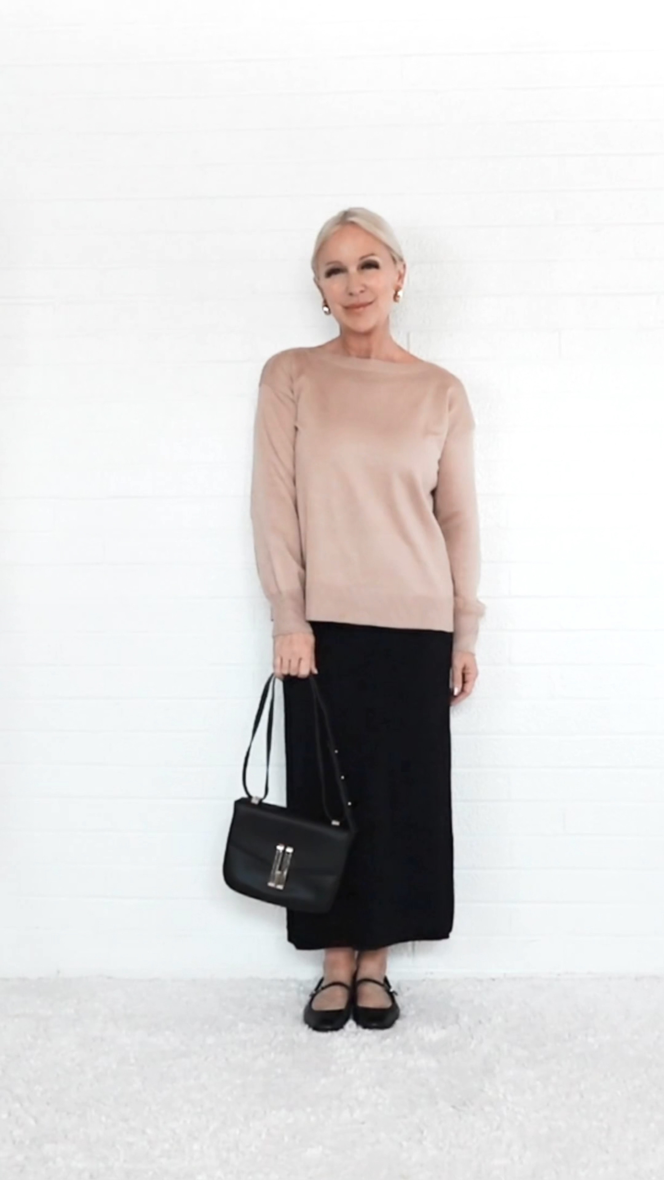 Everyday Elegance: Fall Fashion Tips for Women Over 50.  

This may shock you when I tell you this, but it is possible to look elegant and classy in your everyday life. One way to do that is to pair a simple midi skirt with an oversized but lightweight crew neck sweater and ballet flats. This this is a classic style outfit that I would definitely wear to a coffee run and definitely for a casual lunch.  Comment ELEGANT if you agree. #LTKover50style

#LTKVideo #LTKSeasonal #LTKOver40