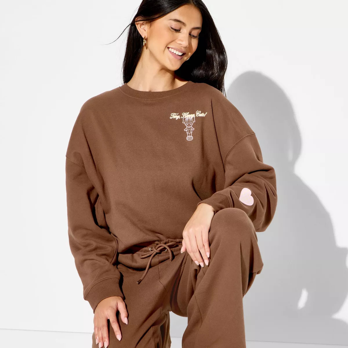 Women's Polly Pocket Fleece Graphic Pullover Sweatshirt - Brown S | Target
