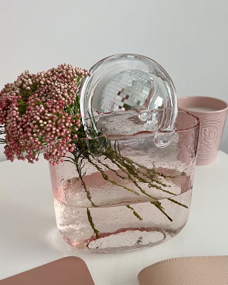 The cutest pink glass purse vase from amazon! 💐

#LTKFind #LTKhome #LTKunder50