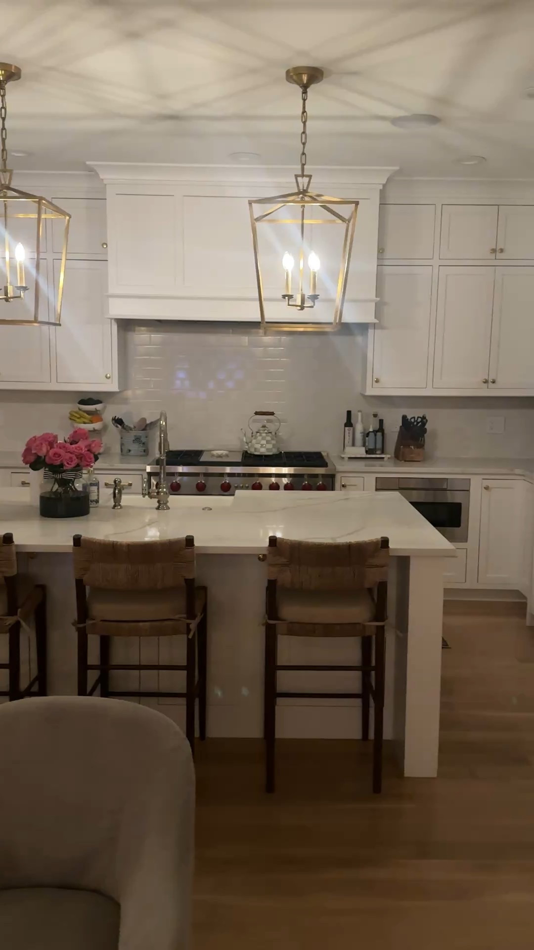 Soft lighting, layered neutrals, and pieces that feel collected over time—not trend-led, just timeless and functional. This is the heart of our home, especially at dusk when everything feels a little quieter.

Sharing sources for the pendants, counter stools, runner, and a few favorite styling details that pull it all together.

#LTKHome #LTKvlog #LTKSaleAlert