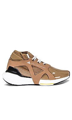 adidas by Stella McCartney Ultraboost 21 Sneaker in Brown, White Vapour & Yellow from Revolve.com | Revolve Clothing (Global)