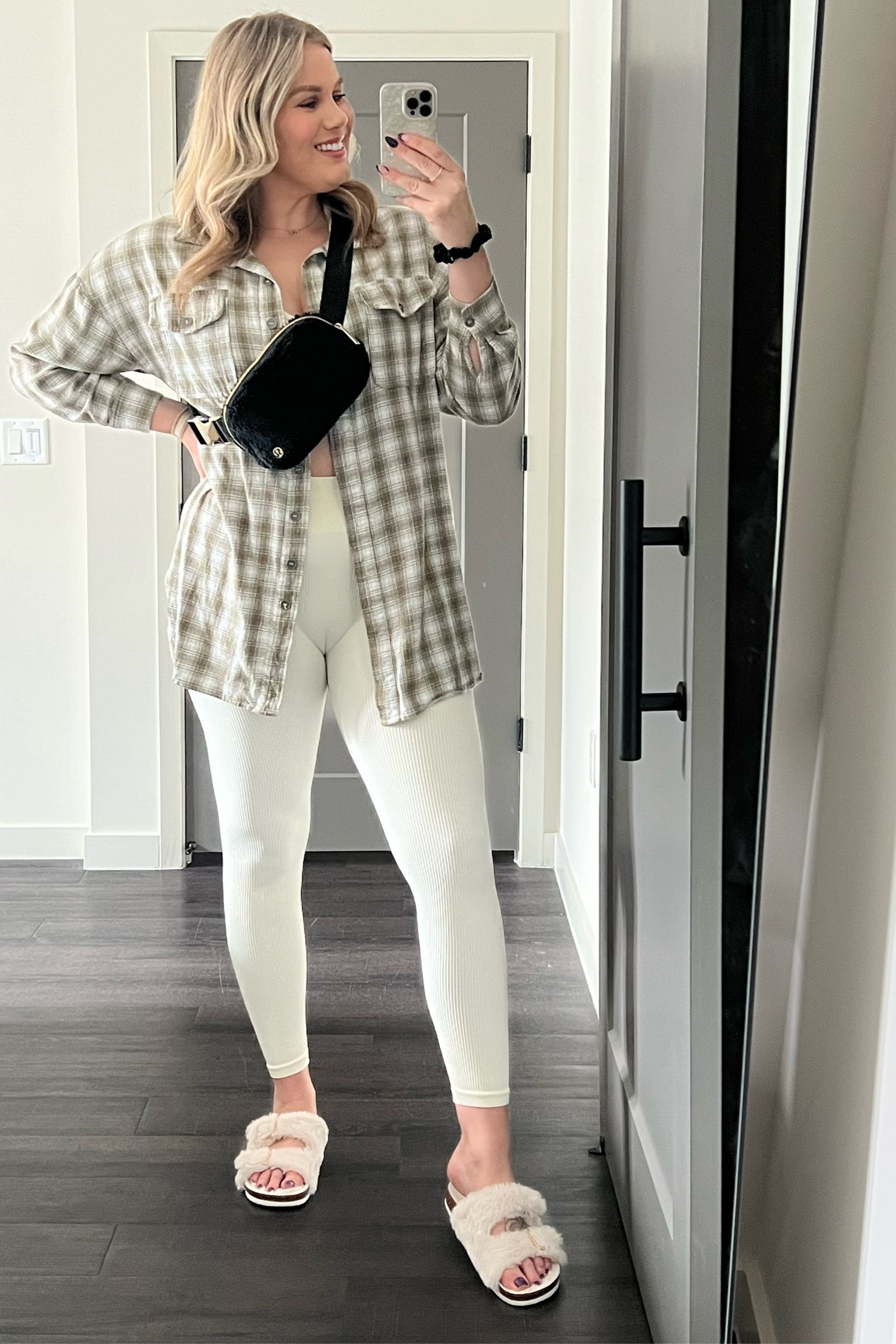 Travel OOTD. 
Amazon 2 piece leggings & crop top set 
Green plaid button down 
Shearling sandals 
Lululemon fleece belt bag
 

#LTKSeasonal #LTKtravel #LTKstyletip