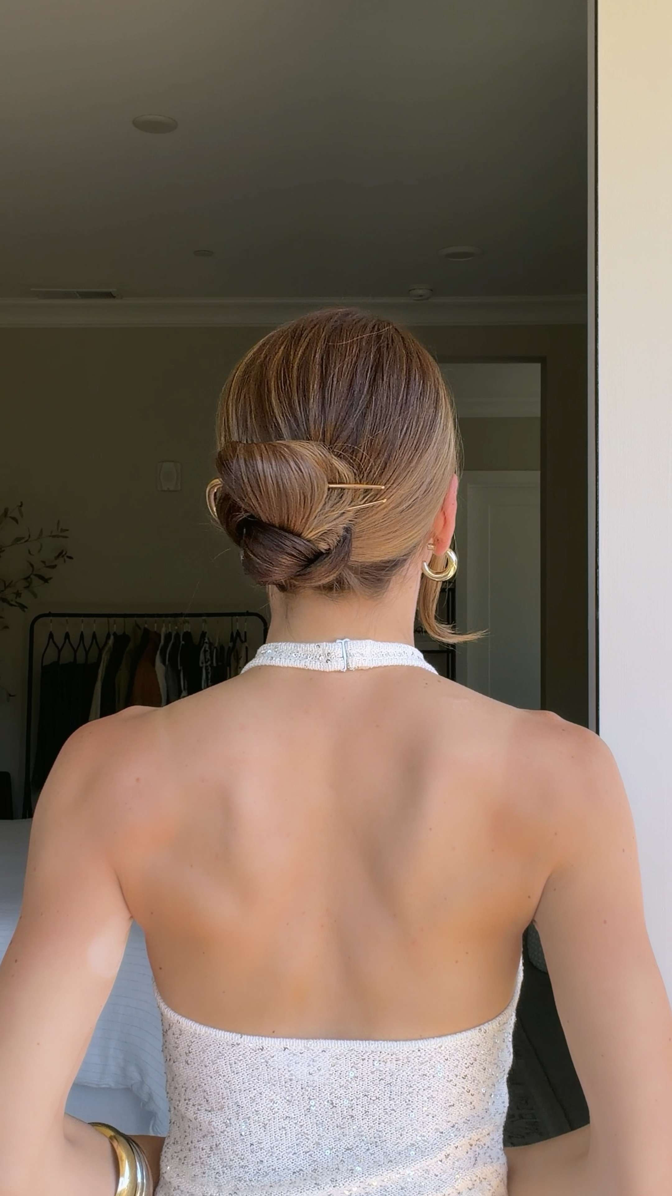 Save this one for the days when a regular bun feels boring ✨ Also, this sequin-embellished knit halter top is GORG for summer or vacation. Wearing size S. 

 #LTKootd #LTKSeasonal #LTKBeauty
