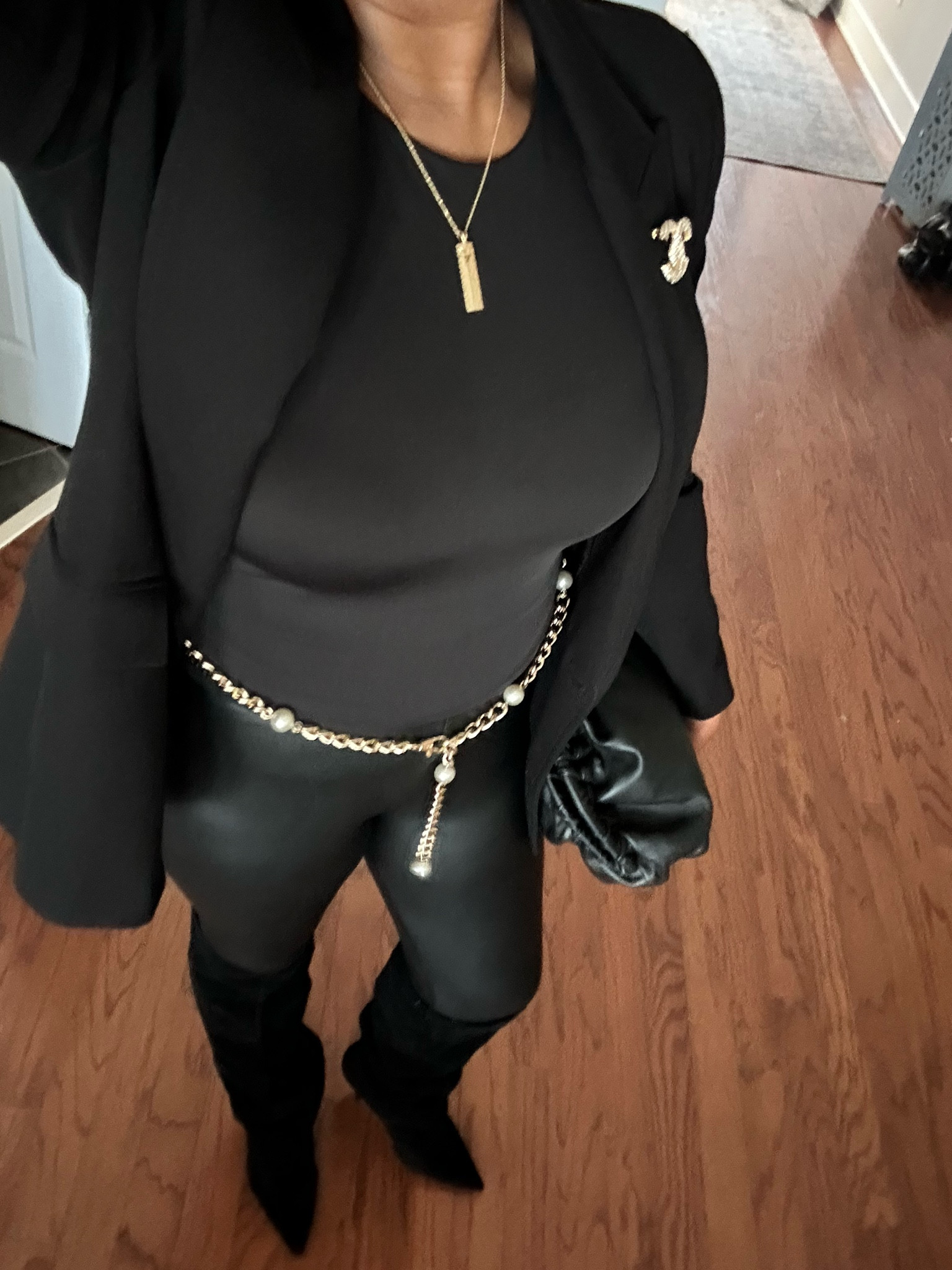 Simple holiday/winter sophistication. Black, faux leather, gold accents and boots. 

#LTKOver40 #LTKHoliday