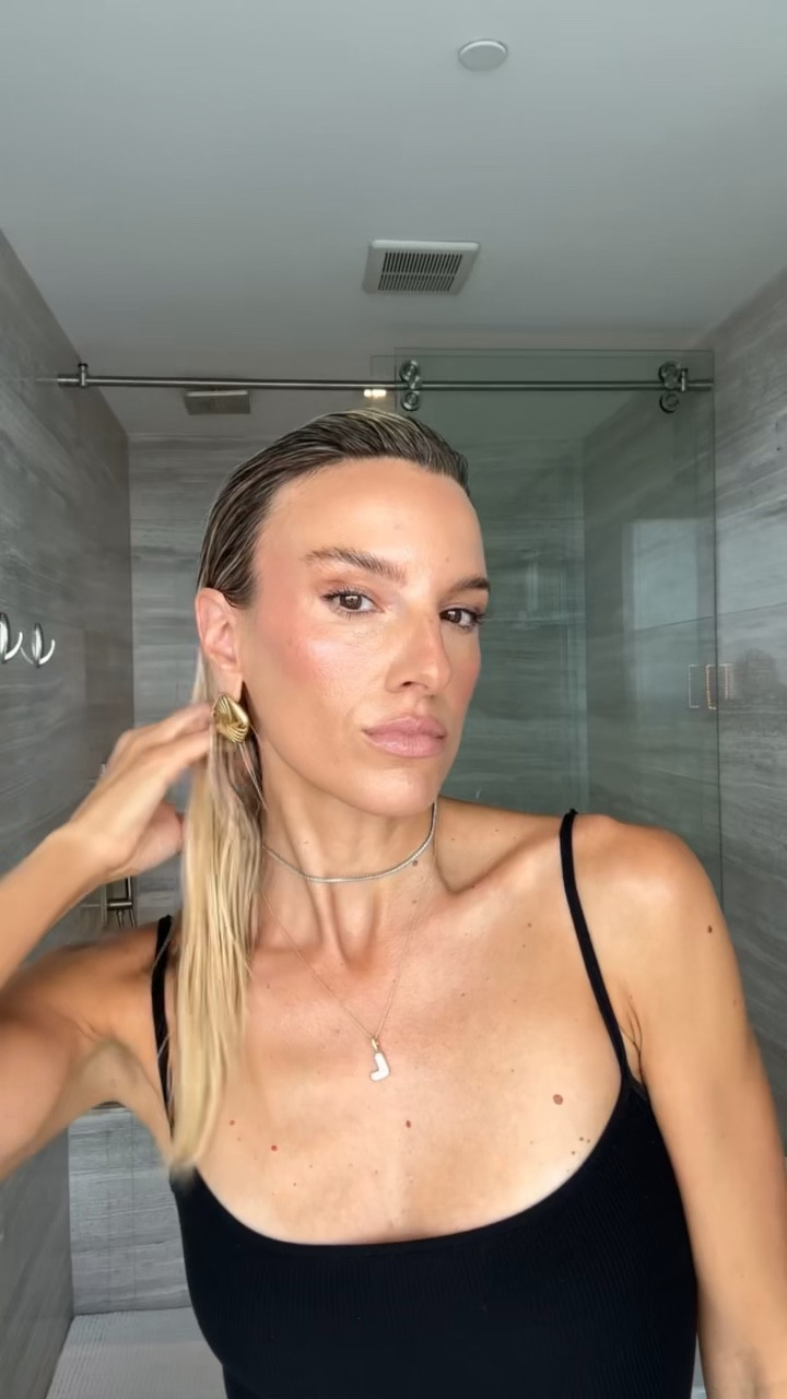 How to get the 5 minute wet slicked back hair. This is the most requested hair tutorial. Love this hairstyle it’s perfect for a night out especially on hot summer nights. It’s super easy and everything I used is linked  

How to: 
1. Start with dry hair.
2. I use the @colorwowhair pop & lock and run it through my hair. This gives the hair shine and you can still run your fingers through the hair. 
3. Saturate the hair with @squigsbeauty hair oil. 
Keep adding more product until the hair looks wet. 
4. Brush through @crownaffair 
5. Use hair spray, (I love @sexyhair) once it looks the way you want. 

Hair, hair tutorial, beauty, hair routine, hairdo, hair style, how to get the slicked back “wet” look

#LTKStyleTip #LTKBeauty #LTKVideo