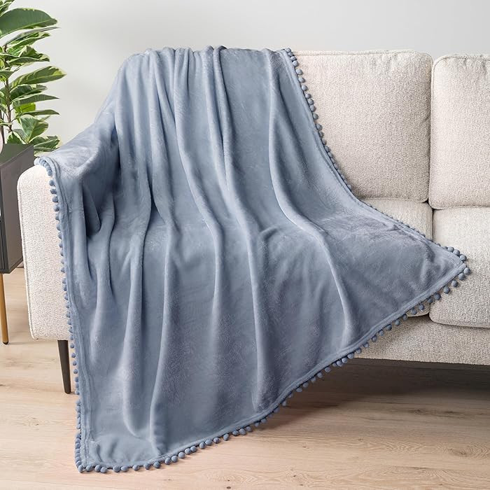 PAVILIA Fleece Throw Blanket for Couch with Pom Pom Fringe, Light Blue Dusty, Soft Cozy Fuzzy Fla... | Amazon (US)