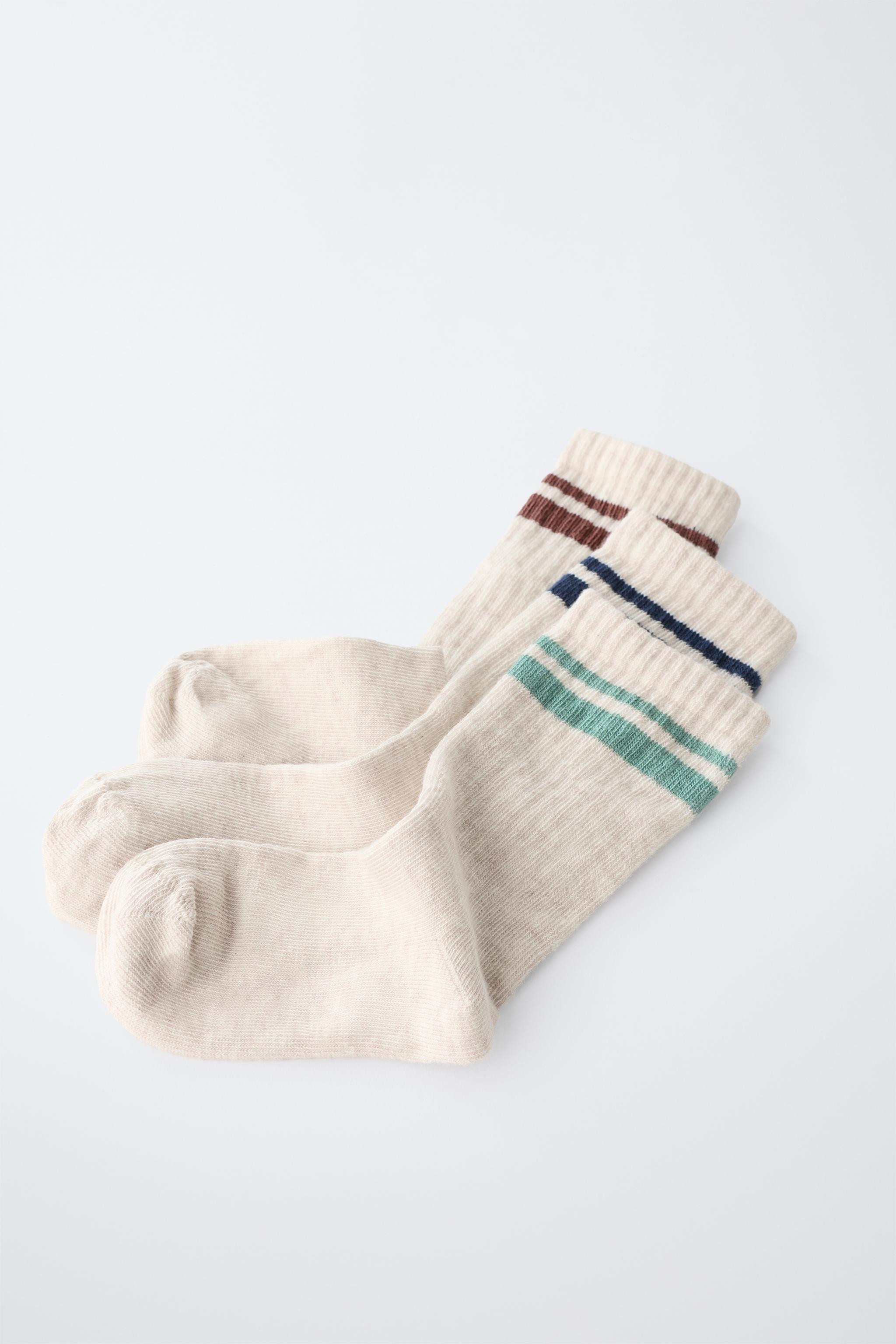 Pack of three mid-calf socks. Features a sporty striped print. | Zara US