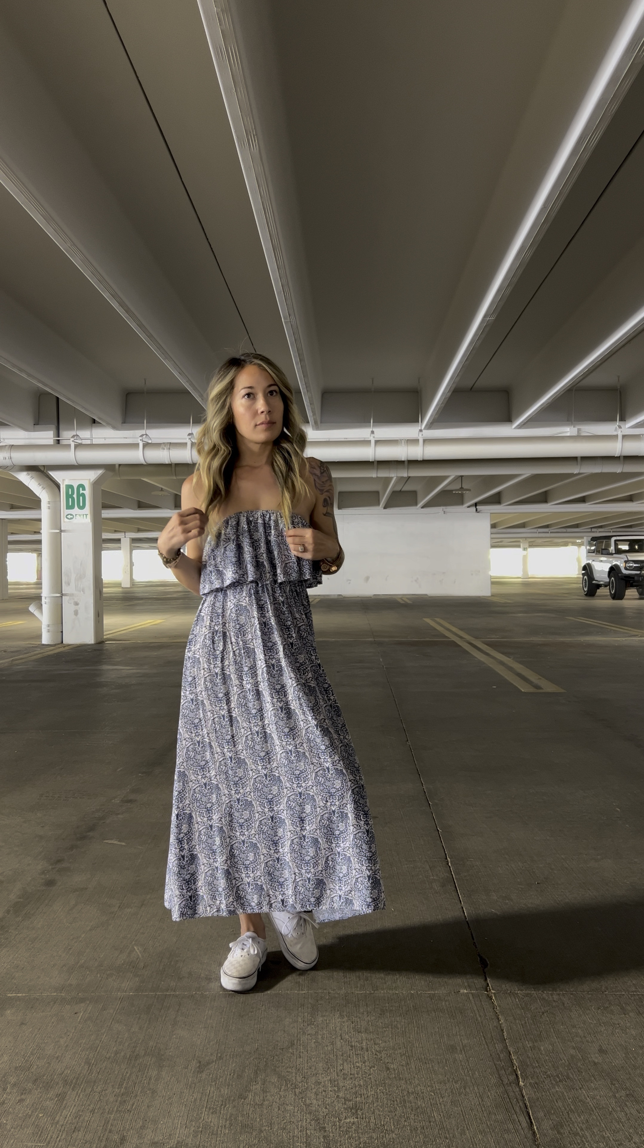 Strapless blue Maxi dress paired with white vans  

#LTKVideo #LTKFindsUnder50 #LTKStyleTip